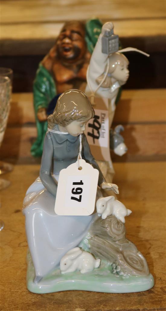 Two Nao Figures of young girls and a Chinese green-glazed figure of Hotei